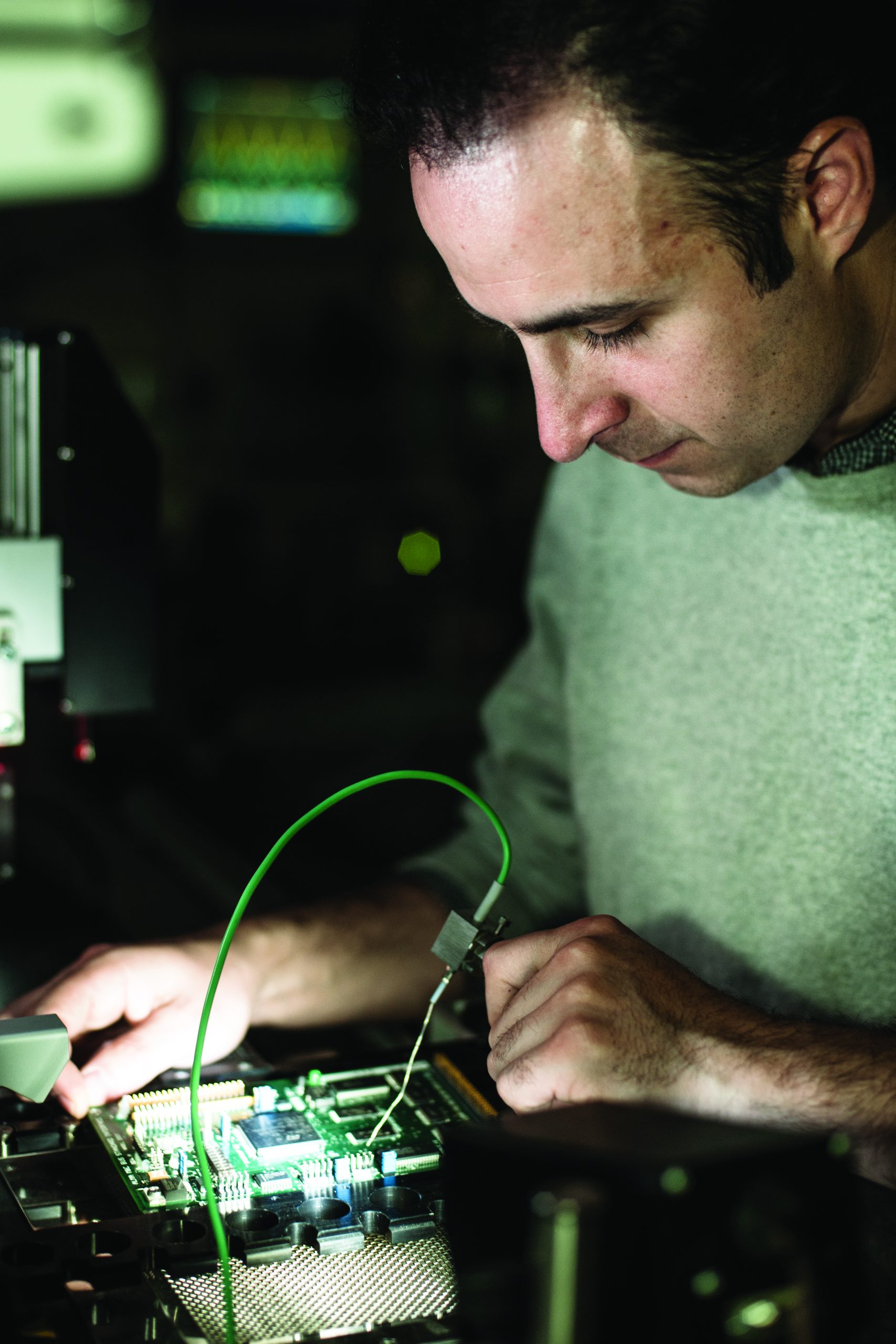 gallery-5 Setting a thermocouple probe in a soldering station.